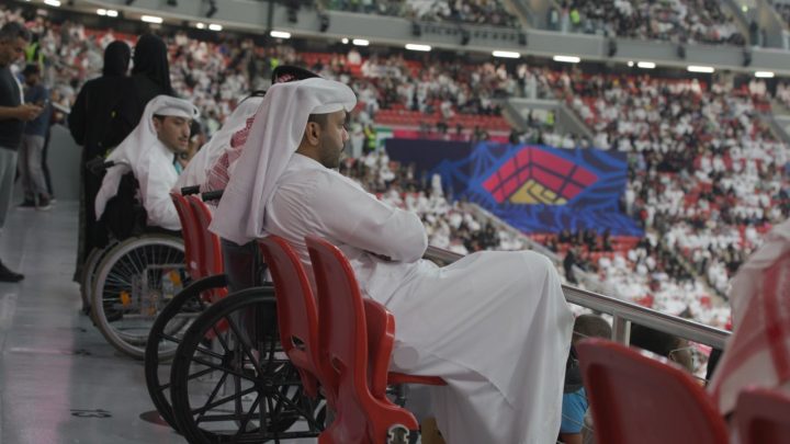 Fans in wheelchairs in accessible seating at Arab Cup
