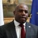 David Lammy in front of a union flag and a European Union flag