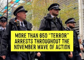 A photo of police officers with a text box saying More than 650 "terror" arrests throughout the November wave of action