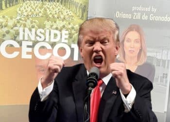 Donald Trump in front of the Inside Cecot image