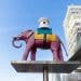 The Elephant and Castle symbol, an elephant with a castle on its back, against a blue sky.