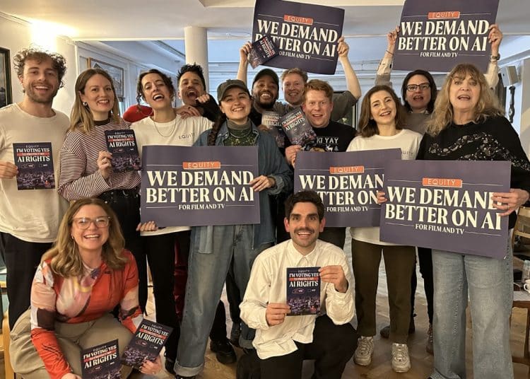 Equity members holding signs saying We Demand Better On AI