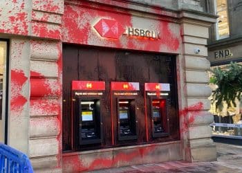 HSBC branch in Newcastle, outside wall and ATMs covered in red paint
