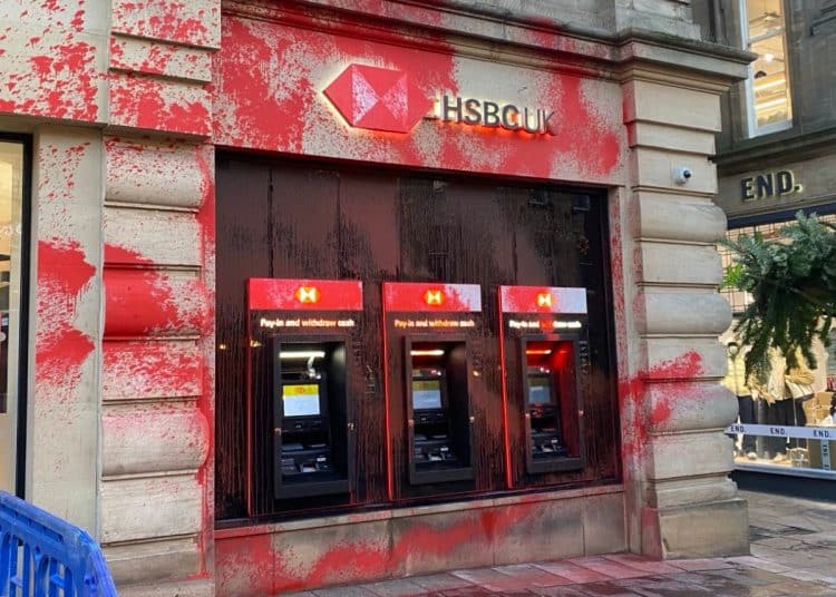 HSBC branch in Newcastle, outside wall and ATMs covered in red paint