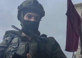 Israeli occupation forces soldier demanding entry into a home in the West Bank