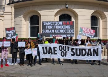 London for Sudan protestors outside the UAE embassy hold a banner saying UAE Out Of Sudan