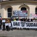 London for Sudan protestors outside the UAE embassy hold a banner saying UAE Out Of Sudan