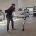 Motion controlled robot kicking the man controlling it in balls