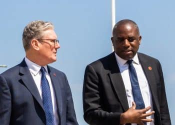 Keir Starmer and David Lammy against a blue sky