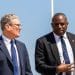 Keir Starmer and David Lammy against a blue sky