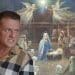 Tommy Robinson in front of a nativity scene