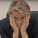 Yvette Cooper with her face in her hands, looking worried