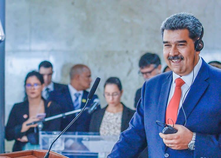 Nicolas Maduro with headphones on