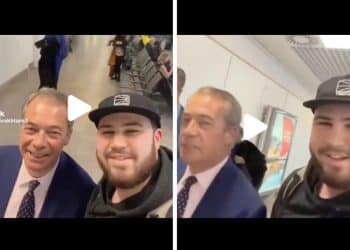 Nigel Farage meeting a fan at the airport