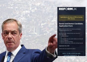 Nigel Farage pointing at a REform UK application form