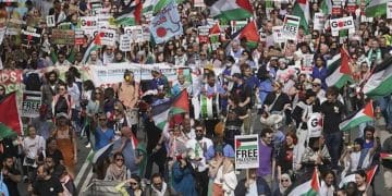 Image from Palestine protests in London. A large crowd with many Palestinian flags and placards