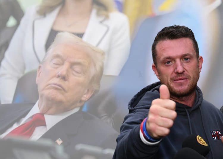 Tommy Robinson in front of an image of Donald Trump sleeping