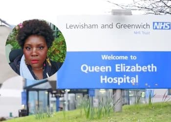 Picture of Savannah Victora-May, with Queen Elizabeth Hospital's entrance sign in the background severe ME medical neglect