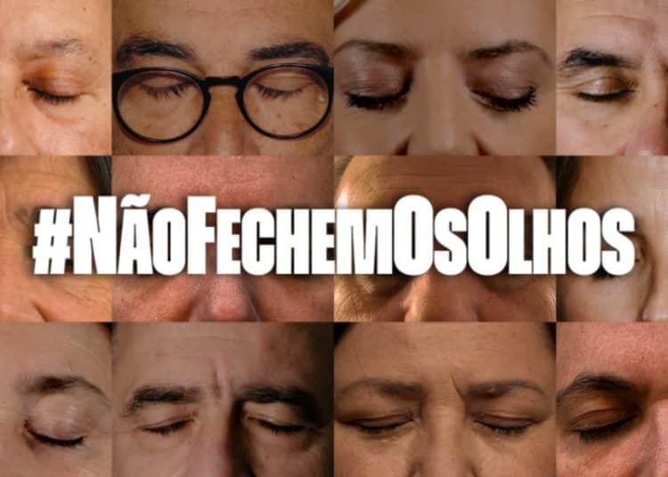 Image of twelve journalists with their eyes shut. Text over the top says #NãoFechemOsOlhos which means Don't Close Your Eyes