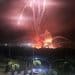 Distant explosions light up the night sky during US attack on Venezuela