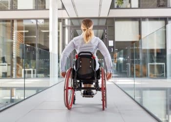 Spinal-cord injury wheelchair user access NHS