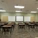 Austere classroom illustrating autistic children's school difficulties