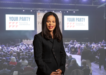 Claudia Webbe in front of Your Party conference image