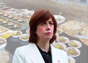 Labour Party — Lucy Powell in front of an Indian buffer