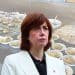 Labour Party — Lucy Powell in front of an Indian buffer