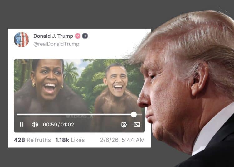 Donald Trump in front of a tweet in which he likened the Obamas to apes