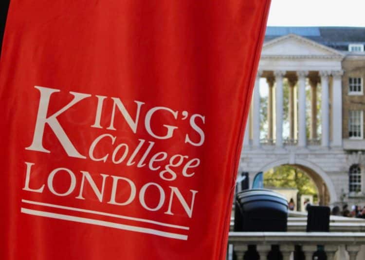 King's College London (KCL) banner hanging in front of uni buildings
