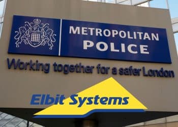 Elbit Systems logo over Met Police sign