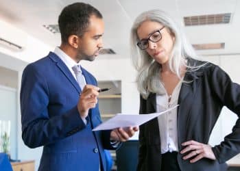 Gender pay gap Man and woman in office