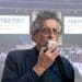 Piers Corbyn superimposed in front of the Your Party conference