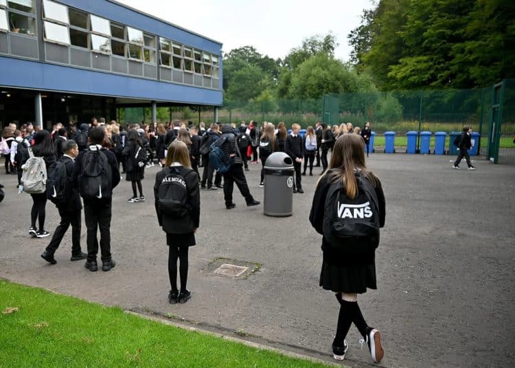 Pupils in school playground. Schools White Paper. SEND proposals.