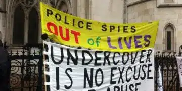Spycops campaign banners outside Royal Courts of Justice during the Undercover Policing Inquiry