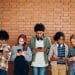 Young people looking at phones