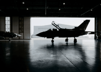 Military spending - an aircraft is stationary in an airplane hangar