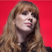 Angela Rayner head shot with her signature long ginger hair curled at the ends
