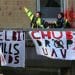 Protest at Manchester office of Chubb Insurance Signs read Elbit Kills Kids and Chubb Drop UAV