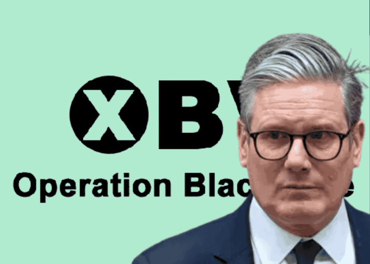 Pale green background with the 'Operation Black Vote' logo. In front of it on the left hand side is Keir Starmer looking guilty. Labour