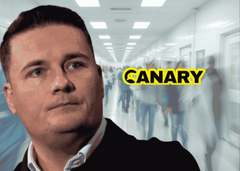 A busy NHS corridor with Wes Streeting looking annoyed