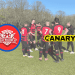 Great Western FC in the background. In the foreground on the left there is the team's logo. On the right is the Canary logo