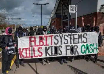 Actionists near Filton hold banner saying Elbit Systems kills kids