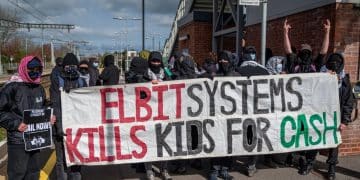 Actionists near Filton hold banner saying Elbit Systems kills kids