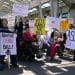 Members of Glasgow Disability Alliance protest against the Assisted Dying (Scotland) Bill