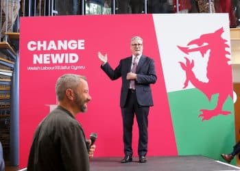 Composite image of YesCymru chair Phyl Griffiths in front of Keir Starmer Senedd memo