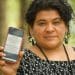 Maya Q’eqchi leader Lesbia Artola shows a screenshot of a social media smear campaign