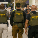 ICE agents in uniform photographed patrolling Louis Armstrong International Airport