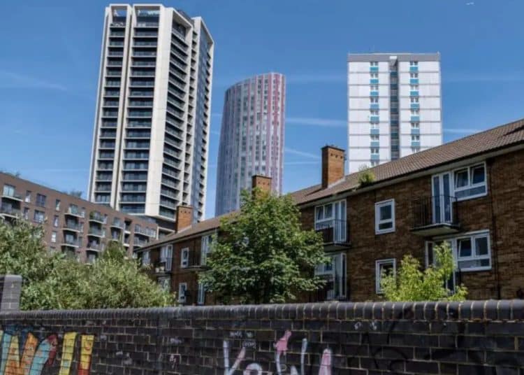 Older housing in the foreground with posh new flats behind